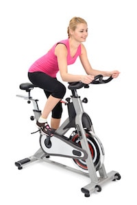 girl riding spin bike